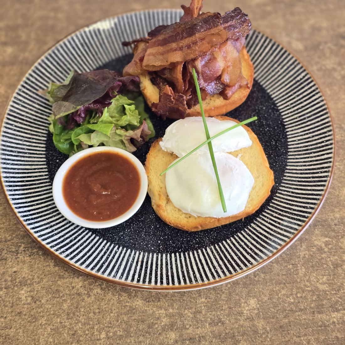 Eggs Benedict with bacon, poached eggs and toasted bread